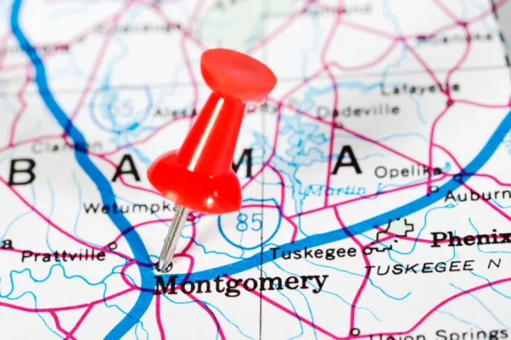 a red push pin on a map of Montgomery, Alabama