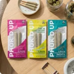 PHUK’D UP | THCA SUGAR DIAMOND INFUSED PRE-ROLLS | 2-PACK_LIFESTYLE Three packs of infused pre-rolls
