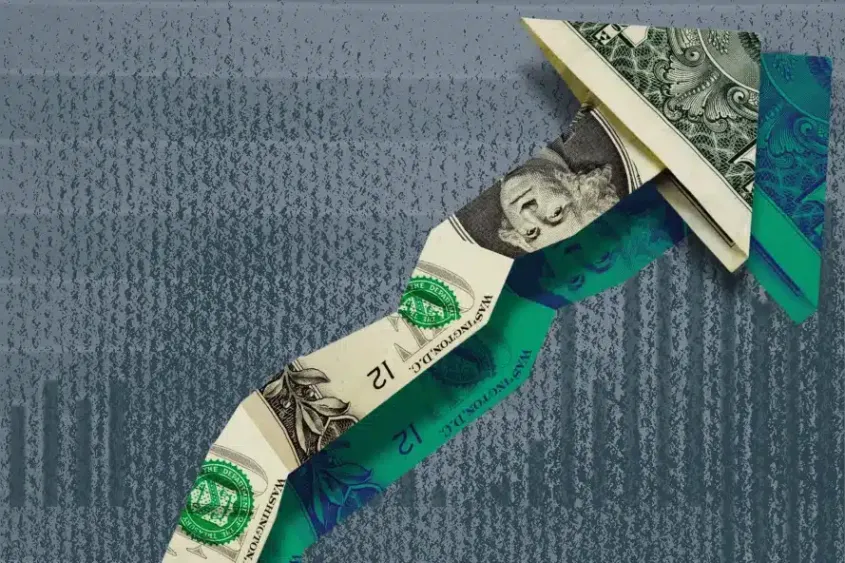 Dollar bills forming an upward arrow