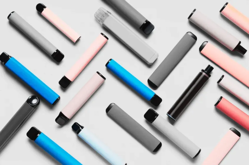 Various disposable vape pens arranged aesthetically