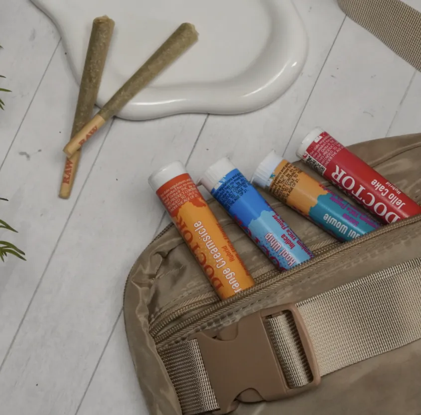Cannabis products and pre-rolls displayed.