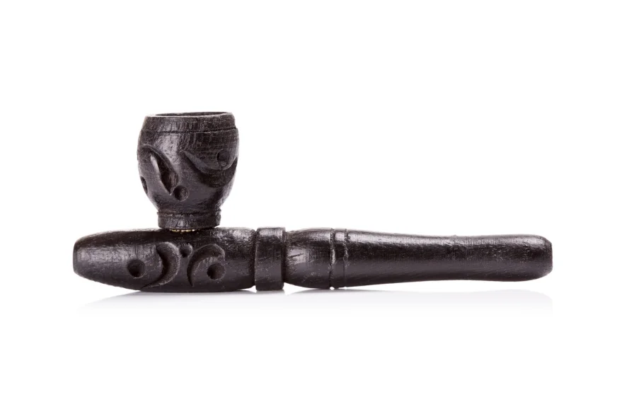 Carved wooden smoking hashish pipe