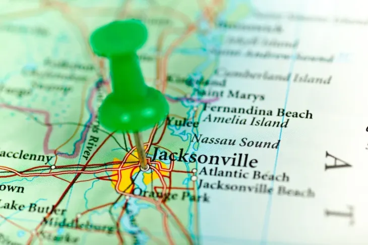 a green push pin on a map of Jacksonville, Florida