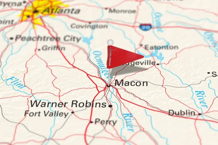 a map with a flag pinned in Macon, GA