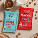 KAYO BITES-25MG-LIFESTYLE Two colorful snack packages on table
