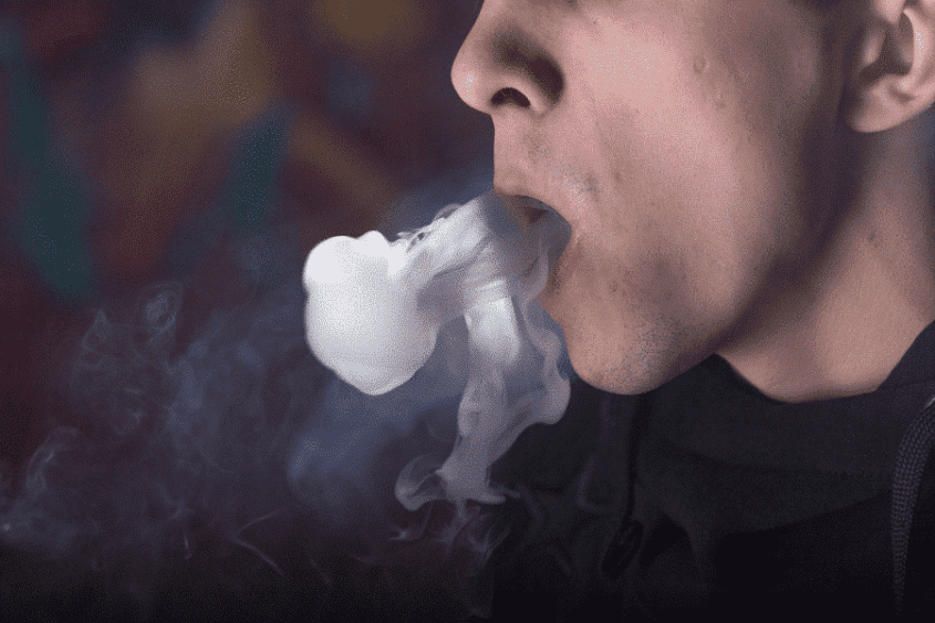 Man smoking salt nicotine