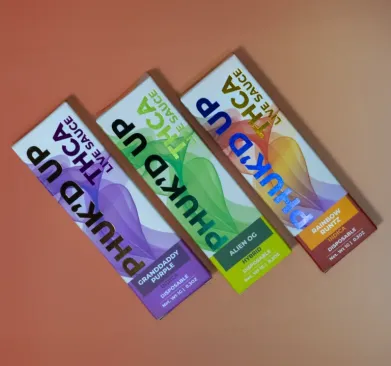 Three cannabis product live sauce boxes displayed.