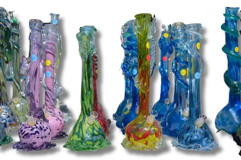 a group of colorful glass bongs